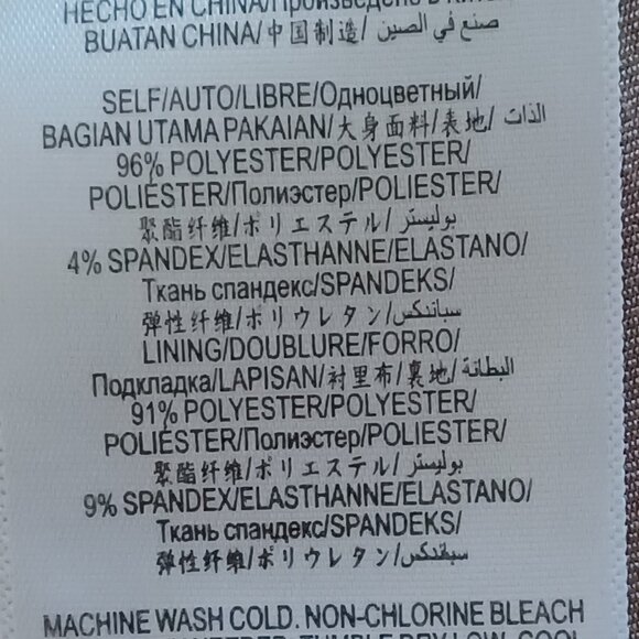 EUC BCBGMaxAzria "Vicktoria" Mixed-Knit Black Peplum Top Size XS - Picture 10 of 11